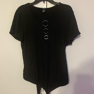 Black ribbed onesie. Low cut with silver hoops.